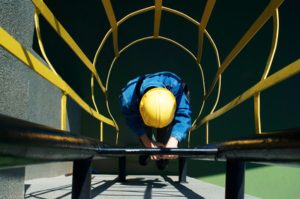 worker climbing in safety stair